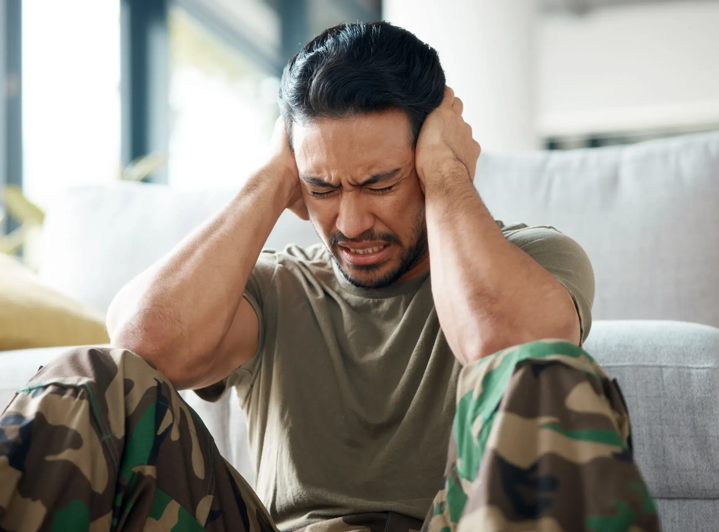 Person considering PTSD treatment at R&C Psychiatry Pembroke Pines FL